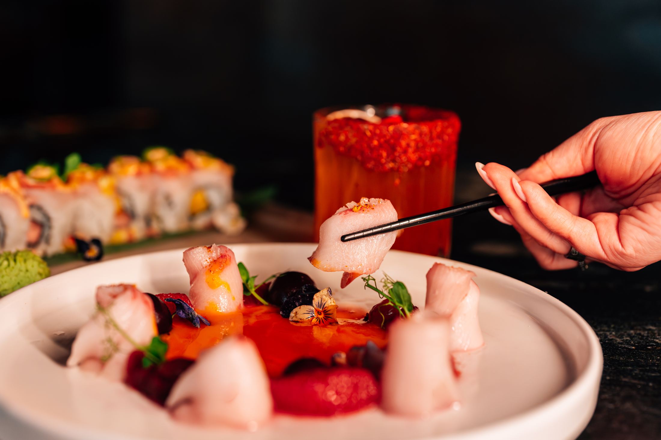 Hamachi crudo and a sushi roll at Violette's